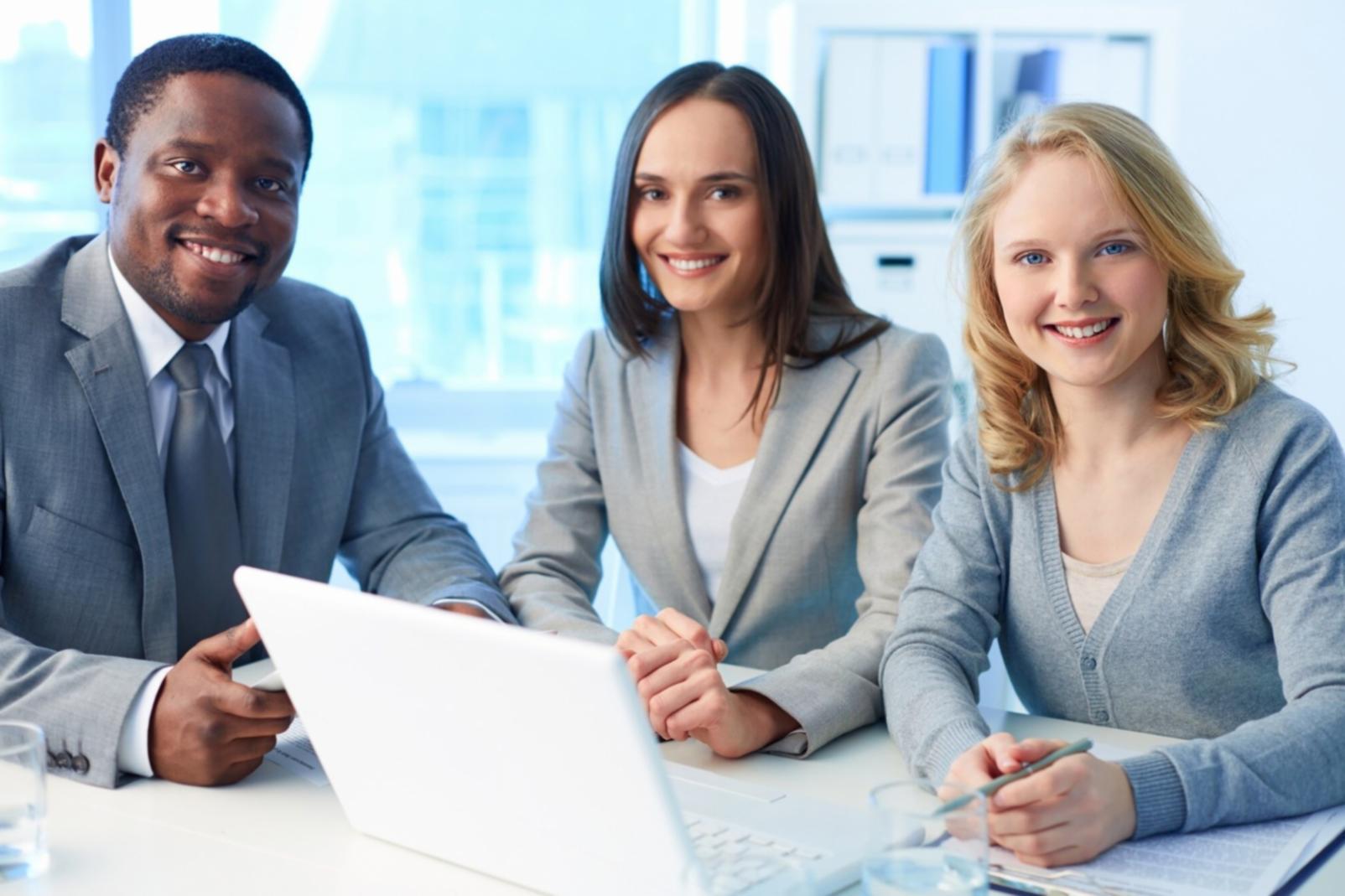 Financial professionals collaborating on data analysis